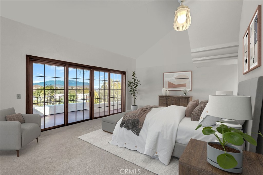 2572 Sunset Drive Riverside, CA 92506 - Photo 30 of 63 a spacious bedroom with a bed and a large window