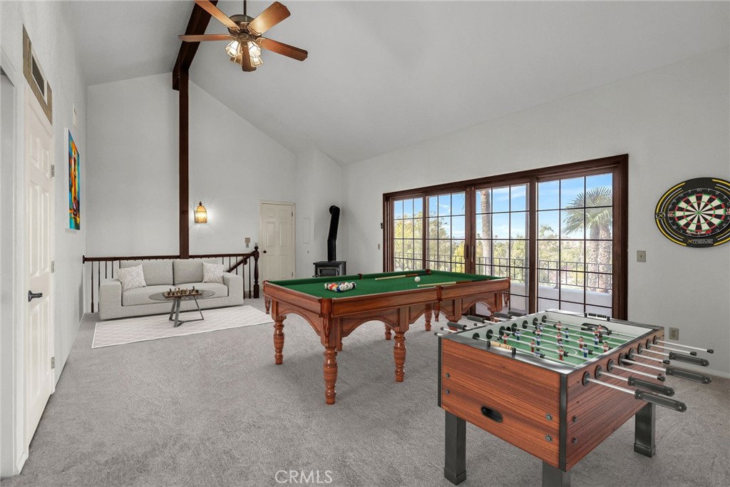 2572 Sunset Drive Riverside, CA 92506 - Photo 41 of 63 a living room with furniture a rug and a window