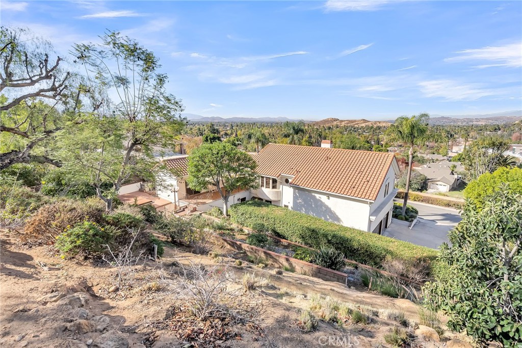 2572 Sunset Drive Riverside, CA 92506 - Photo 50 of 63 a view of a lake with a building in the background