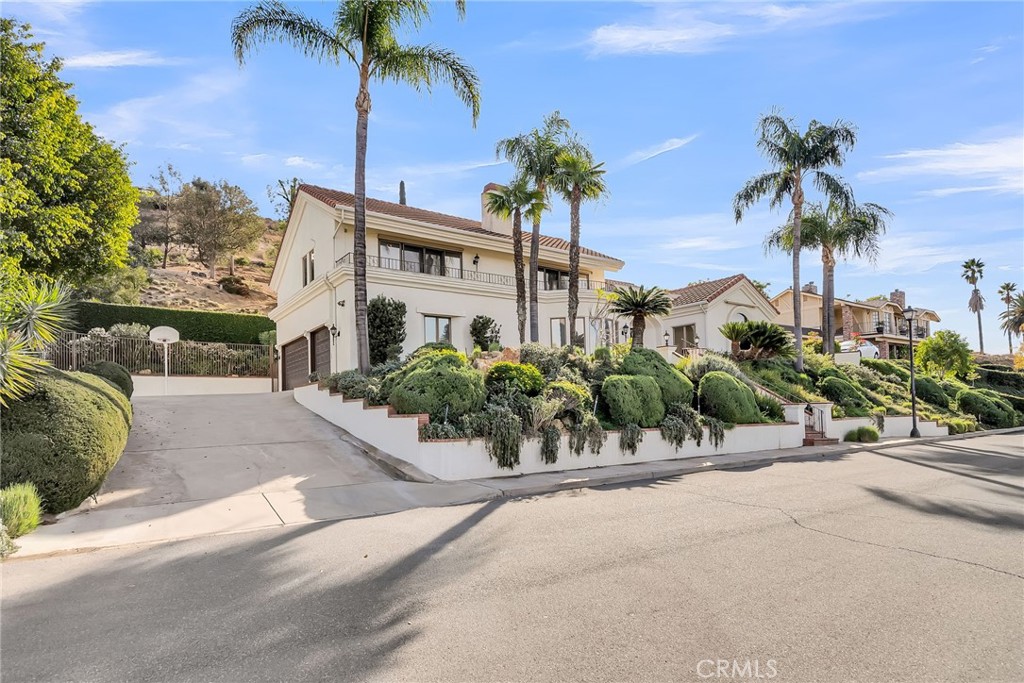 2572 Sunset Drive Riverside, CA 92506 - Photo 5 of 63 front view of a house with a street