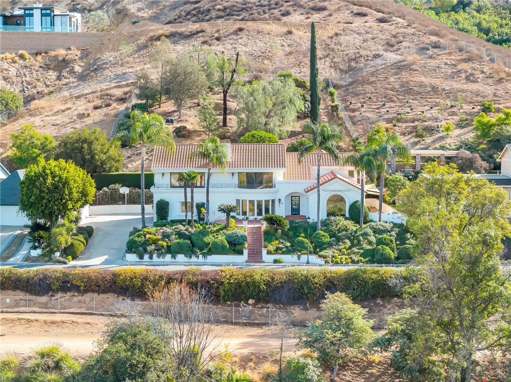 2572 Sunset Drive Riverside, CA 92506 - Photo 56 of 63 a front view of a house with a garden