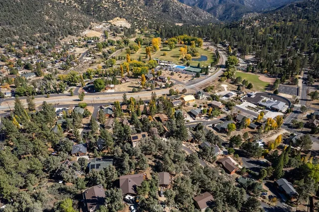 a view of a city with mountains in the background