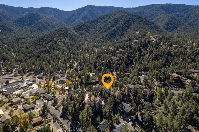 an aerial view of residential house and green space