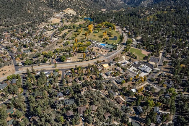 a view of a city with mountains in the background