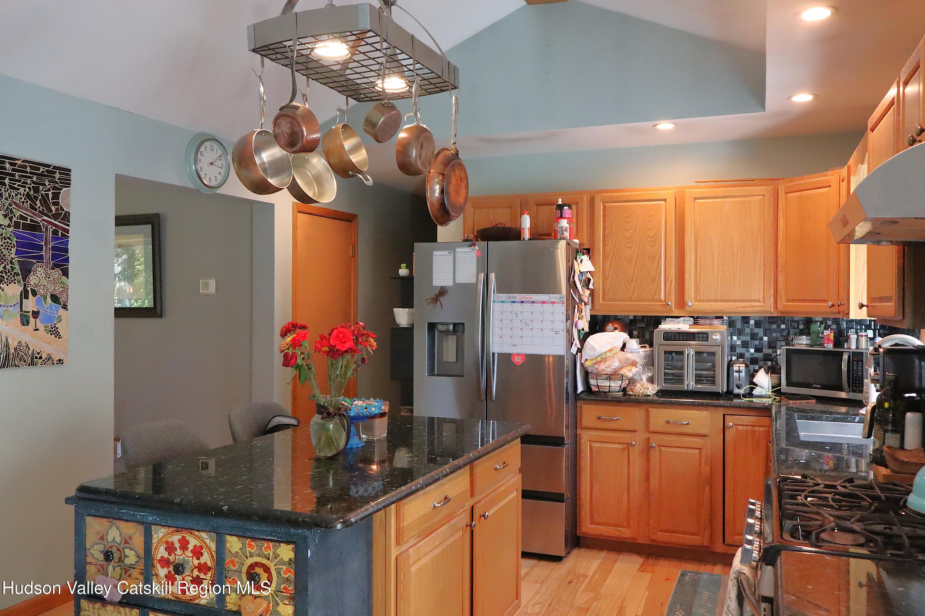 132 Dutchtown Road Saugerties, NY 12477 - Photo 13 of 45 a kitchen with stainless steel appliances granite countertop a stove and cabinets
