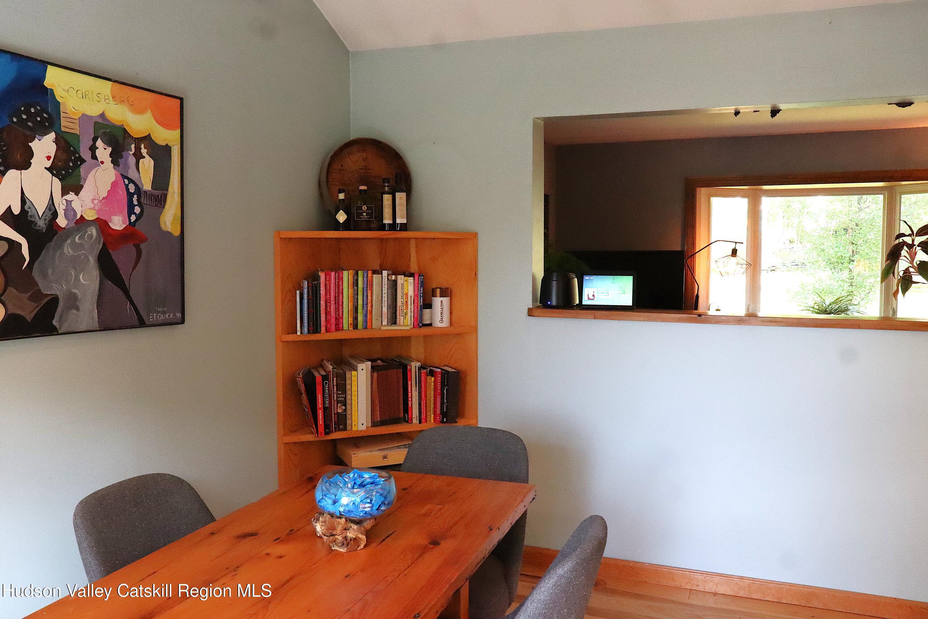 132 Dutchtown Road Saugerties, NY 12477 - Photo 14 of 45 a view of a dining room with furniture and wooden floor
