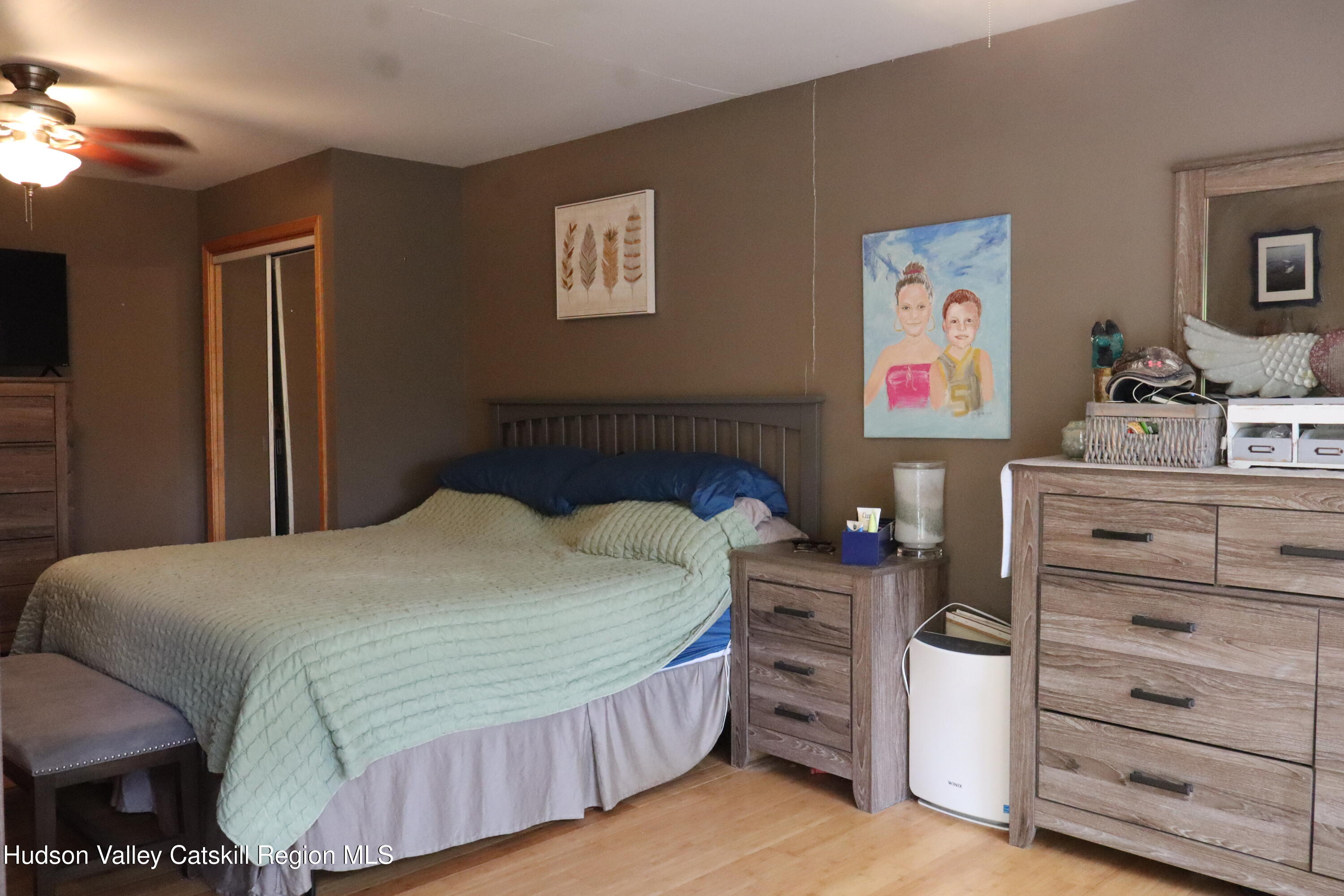 132 Dutchtown Road Saugerties, NY 12477 - Photo 23 of 45 a bedroom with a bed and a dresser