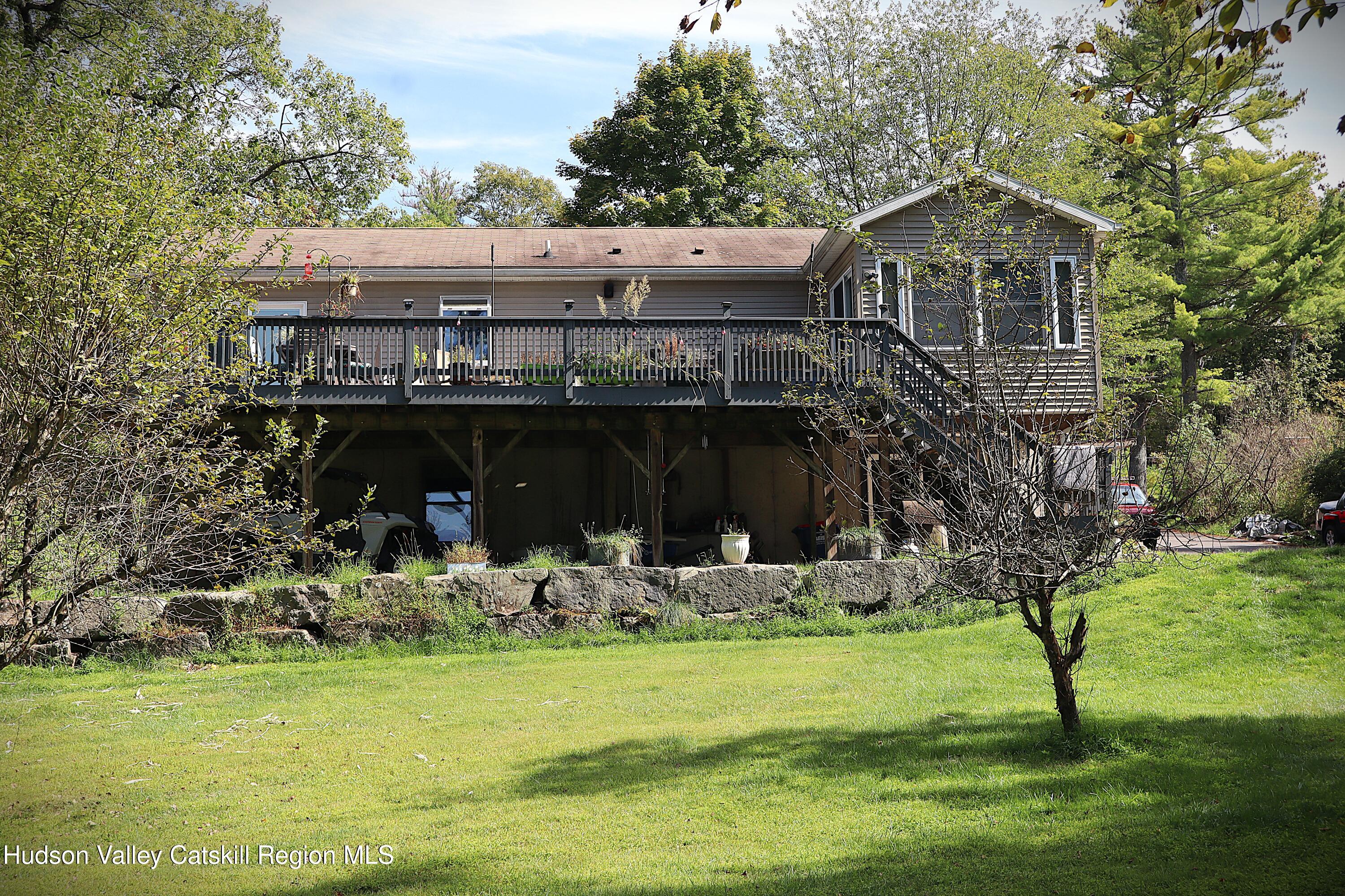 132 Dutchtown Road Saugerties, NY 12477 - Photo 3 of 45 a view of a house with a yard balcony and sitting area