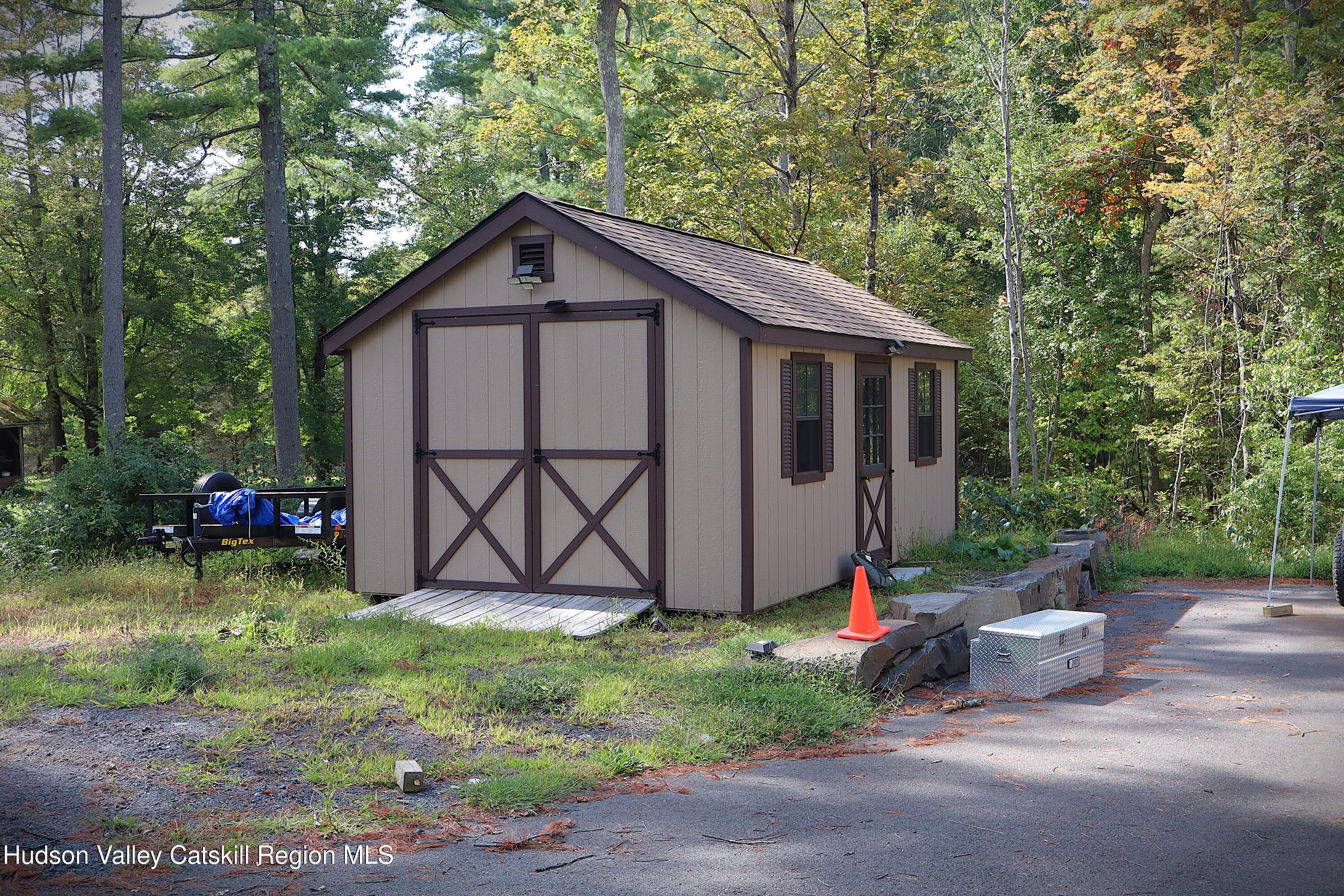 132 Dutchtown Road Saugerties, NY 12477 - Photo 38 of 45 a view of backyard with small garden and deck