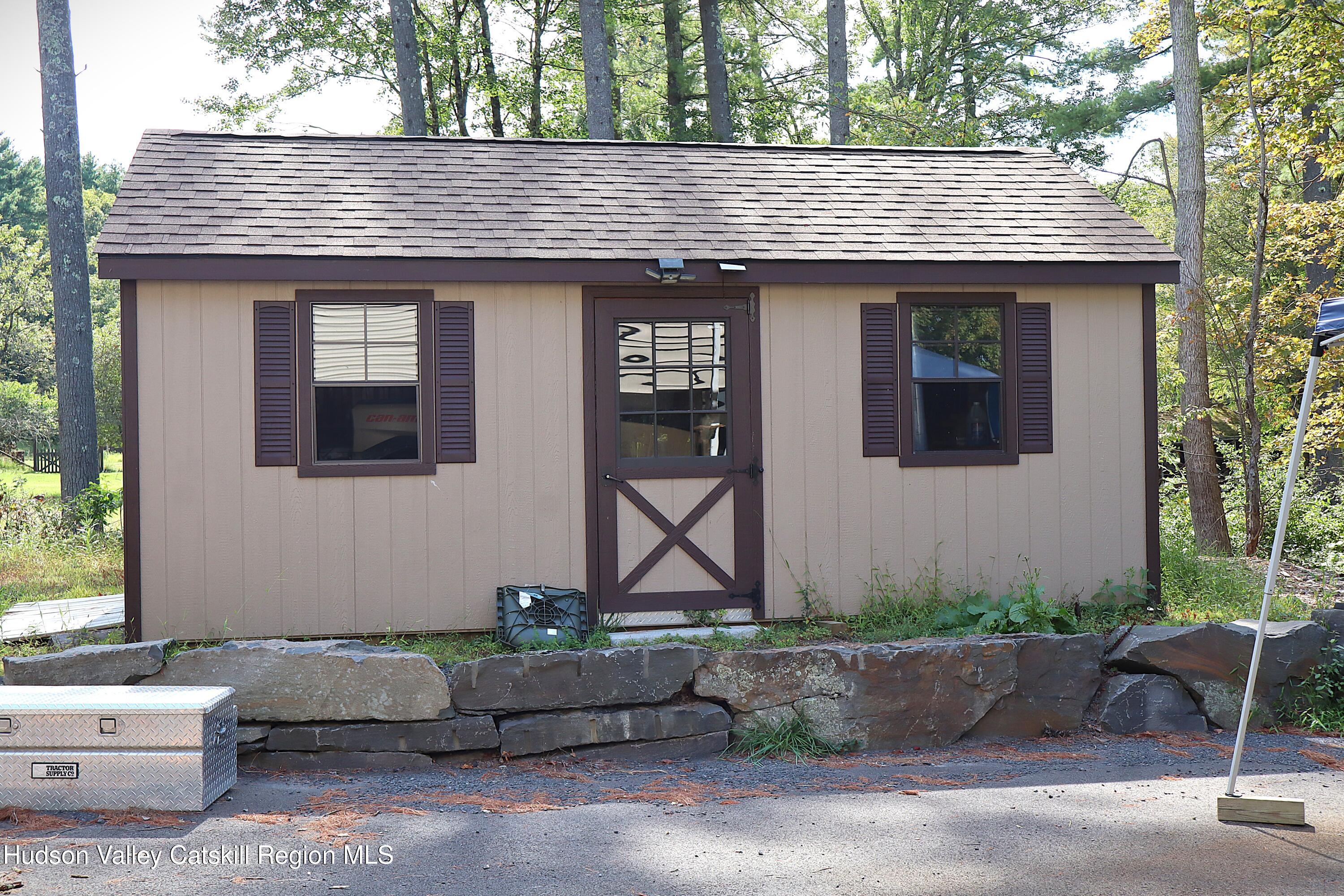 132 Dutchtown Road Saugerties, NY 12477 - Photo 39 of 45 a front view of a house with garden