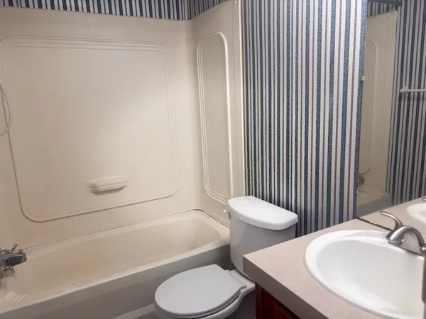 a bathroom with a sink and a toilet