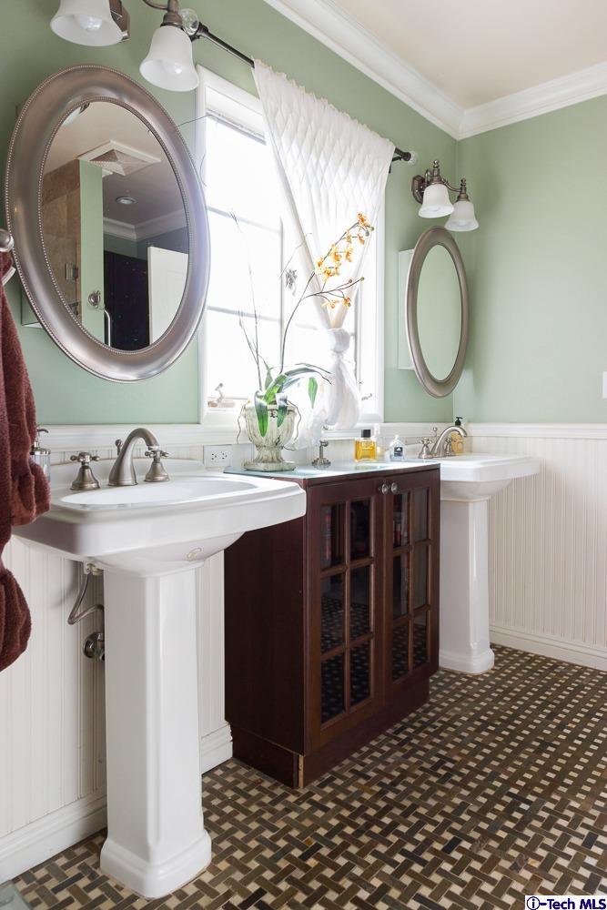 3830 Shadow Grove Road Pasadena, CA 91107 - Photo 14 of 31 a bathroom with a sink and a mirror