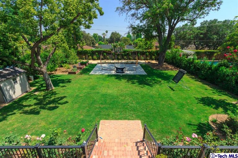 3830 Shadow Grove Road Pasadena, CA 91107 - Photo 29 of 31 a backyard of a house with a garden and outdoor seating