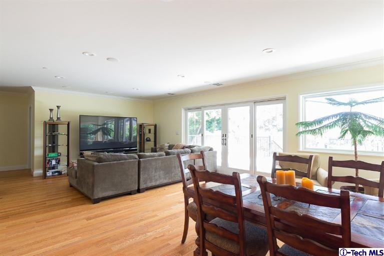 3830 Shadow Grove Road Pasadena, CA 91107 - Photo 6 of 31 a living room with furniture and a flat screen tv