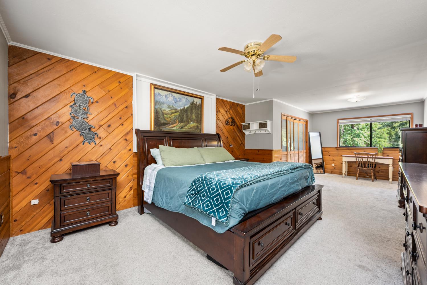 2162 Painted Pony Road Somerset, CA 95684 - Photo 22 of 72 a bedroom with a bed and a chandelier