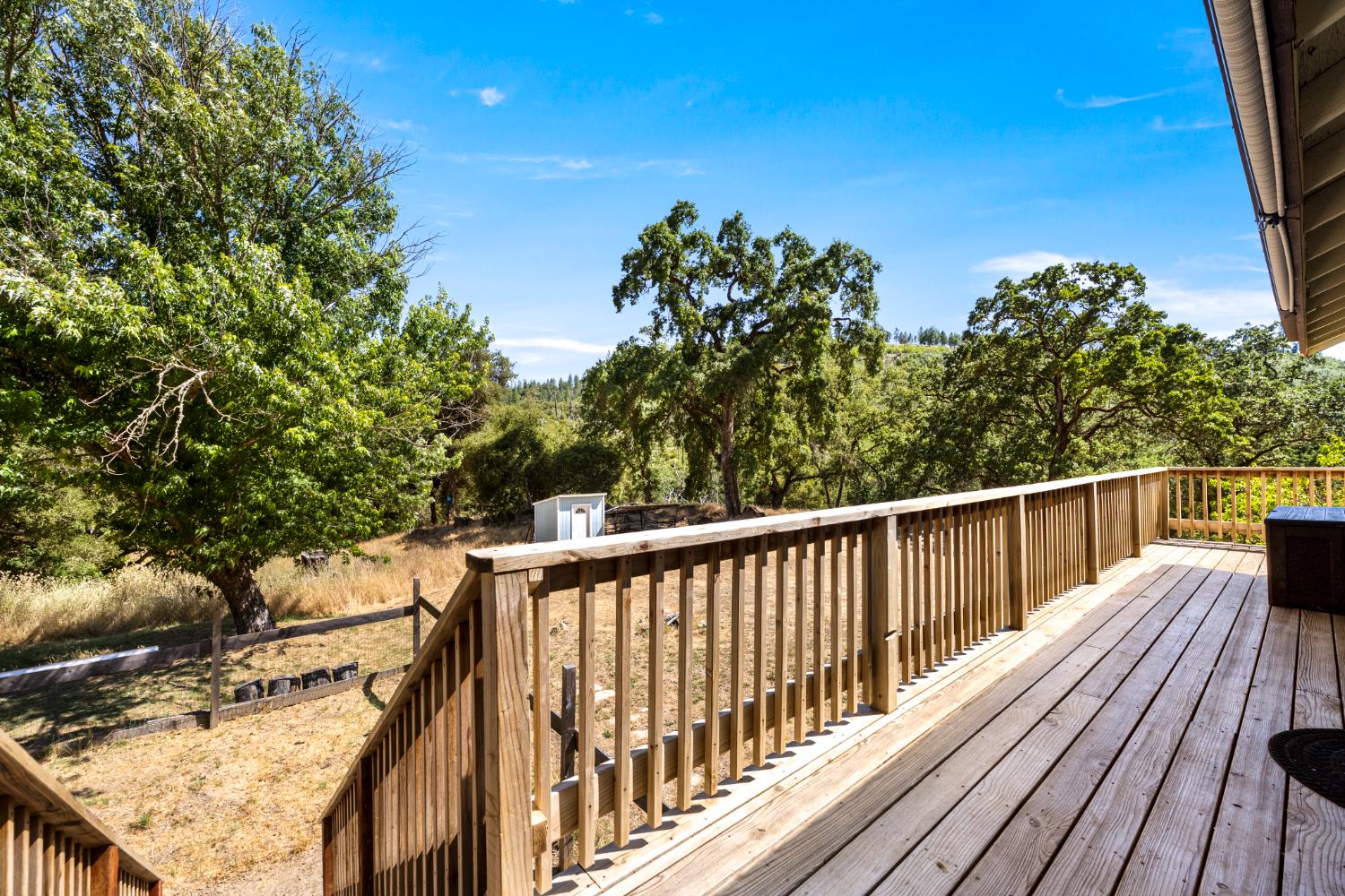 2162 Painted Pony Road Somerset, CA 95684 - Photo 30 of 72 a view of balcony with wooden floor and fence