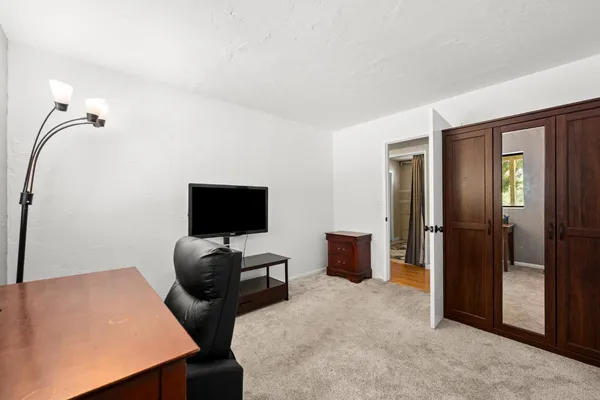 a view of a backyard of the house