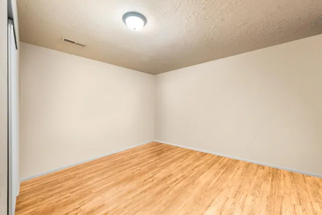 a view of a backyard of the house