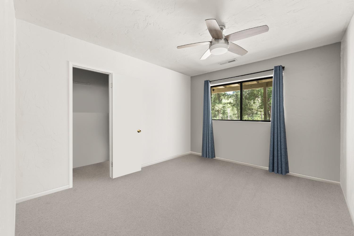 2162 Painted Pony Road Somerset, CA 95684 - Photo 49 of 72 a view of an empty room with a window