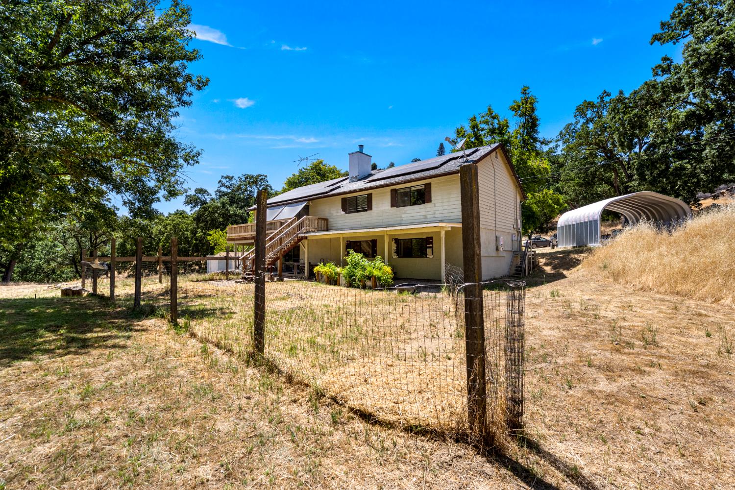 2162 Painted Pony Road Somerset, CA 95684 - Photo 54 of 72 a view of a house with a yard