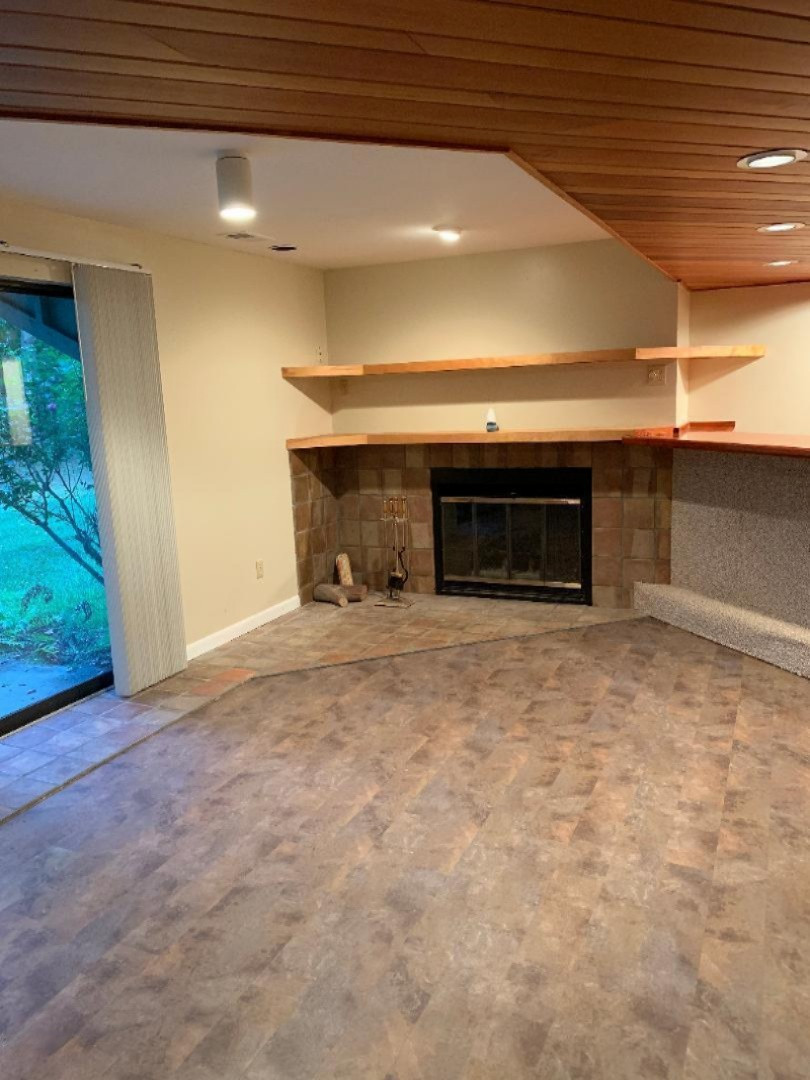 3731 Cedaridge Road, Unit 14 Kalamazoo, MI 49008 - Photo 25 of 45 Lower level fireplace