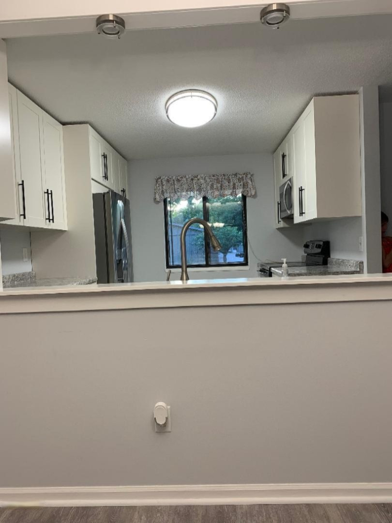3731 Cedaridge Road, Unit 14 Kalamazoo, MI 49008 - Photo 5 of 45 looking into kitchen