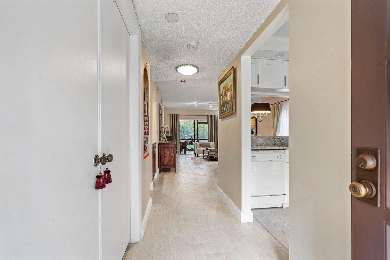5200 East Club Circle, Unit 106 Boca Raton, FL 33487 - Photo 4 of 31 008-5200EastClubCircle-106-BocaRaton-FL-