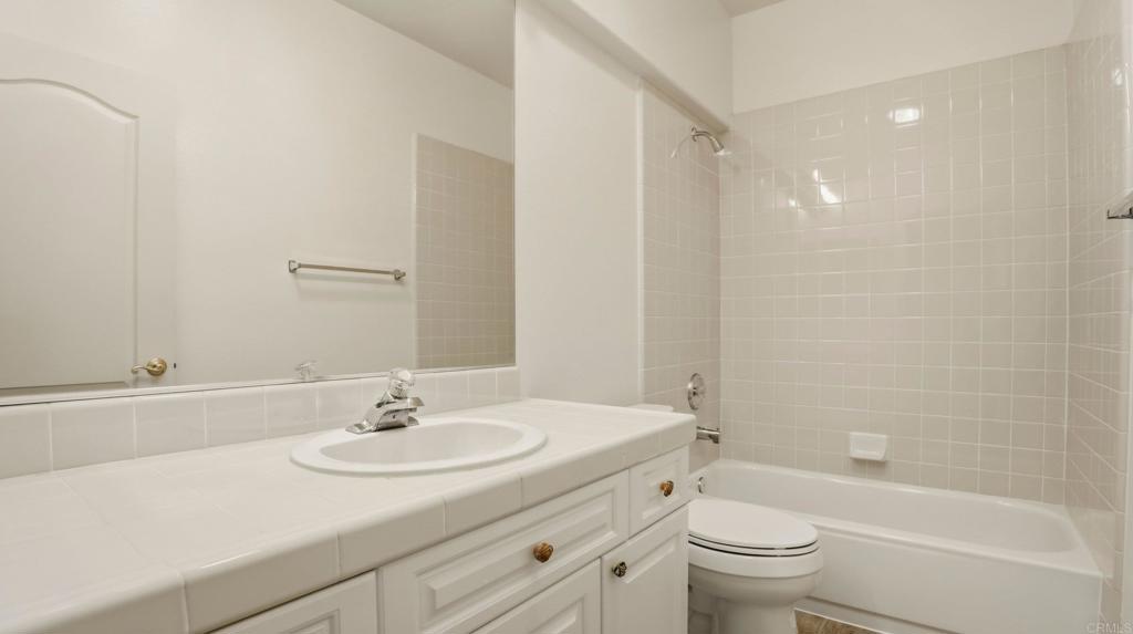 2527 Southern Oak Road Ramona, CA 92065 - Photo 31 of 56 a bathroom with a sink toilet and a bathtub