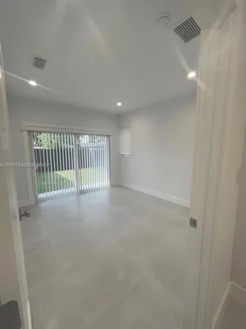 a view of a livingroom with entryway