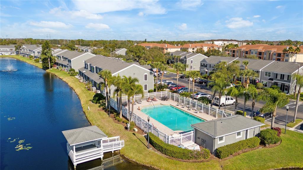 291 Countryside Key Boulevard Oldsmar, FL 34677 - Photo 23 of 34 an aerial view of a house with outdoor space swimming pool and ocean view