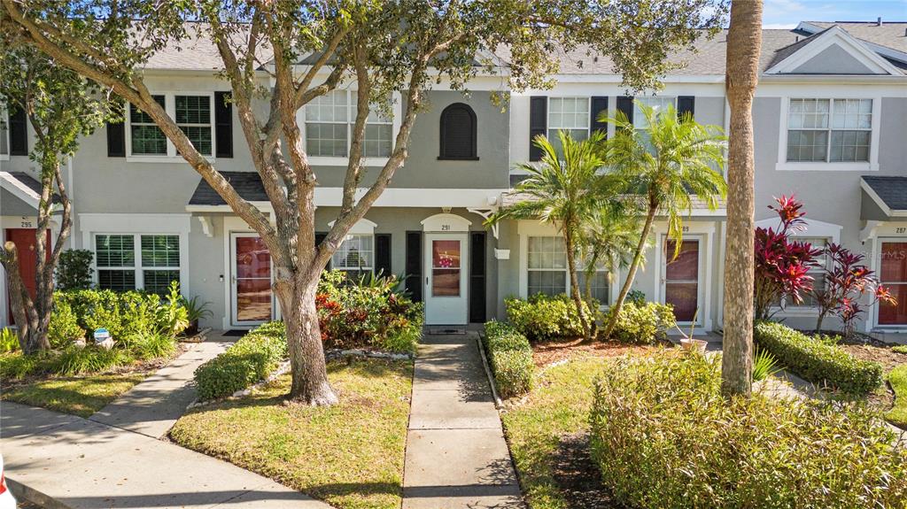 291 Countryside Key Boulevard Oldsmar, FL 34677 - Photo 25 of 34 front view of a house with a yard