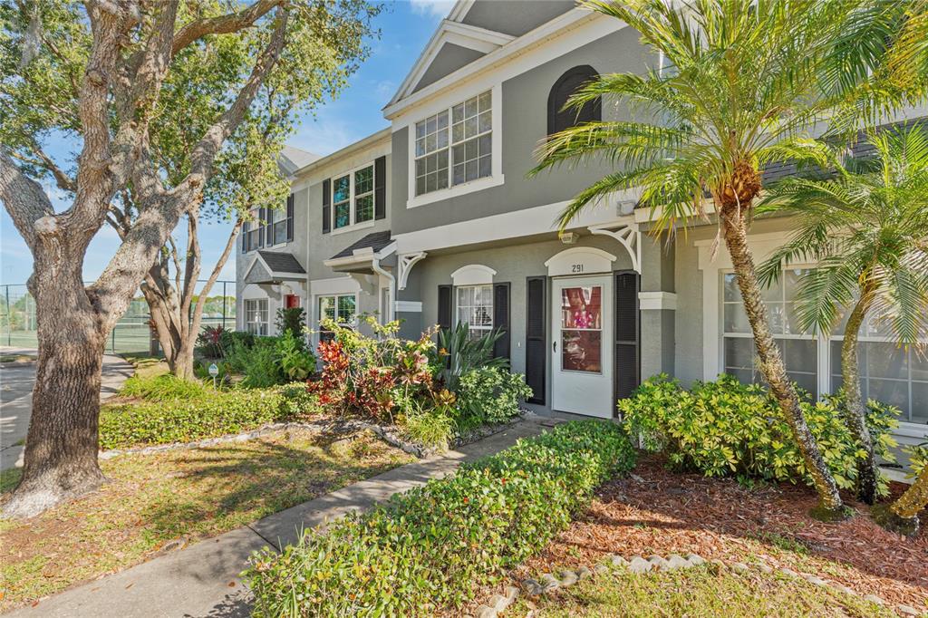 291 Countryside Key Boulevard Oldsmar, FL 34677 - Photo 28 of 34 front view of a house with a yard