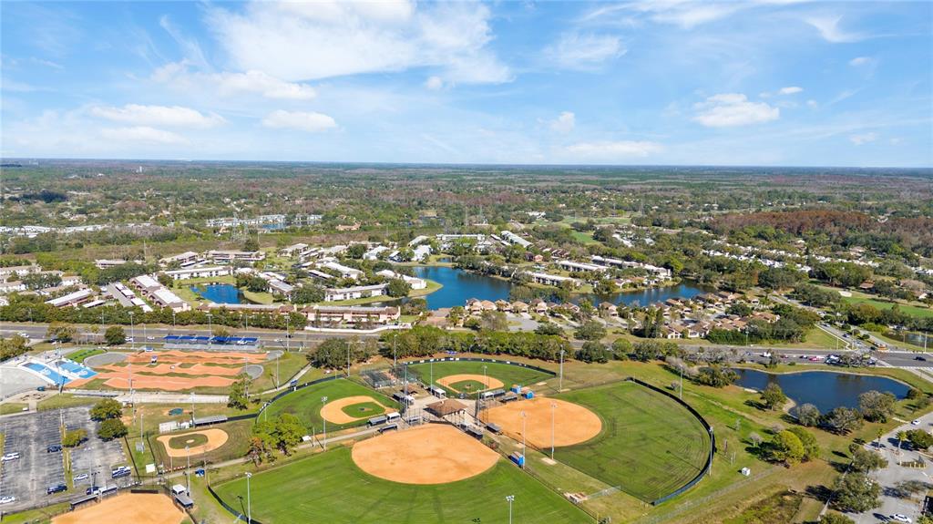 291 Countryside Key Boulevard Oldsmar, FL 34677 - Photo 30 of 34 an aerial view of residential houses with outdoor space