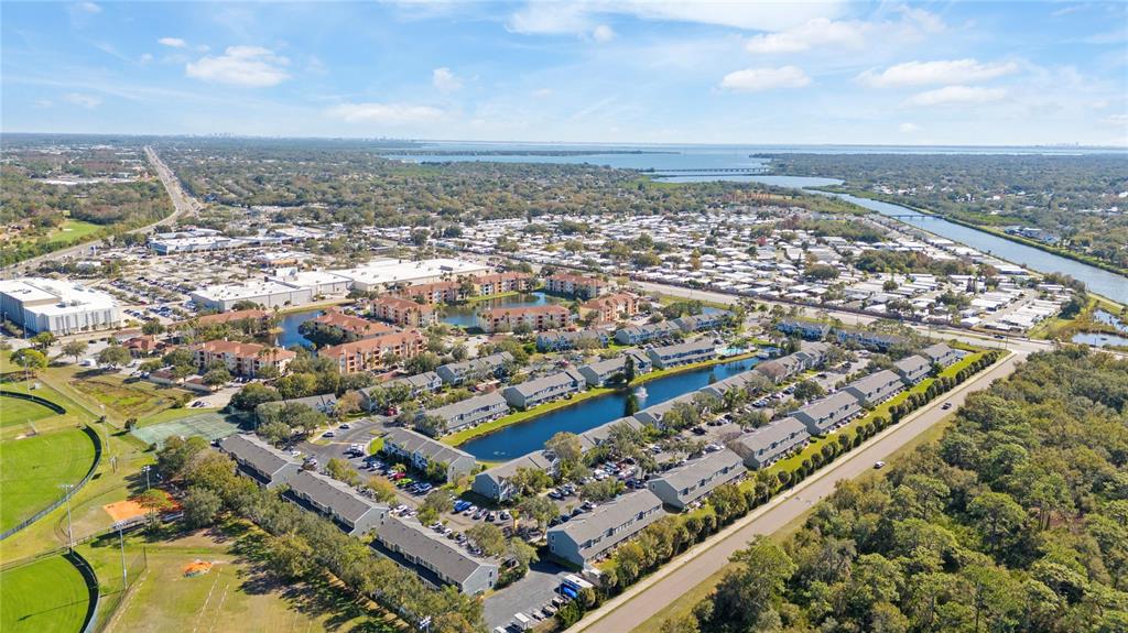291 Countryside Key Boulevard Oldsmar, FL 34677 - Photo 32 of 34 an aerial view of a city
