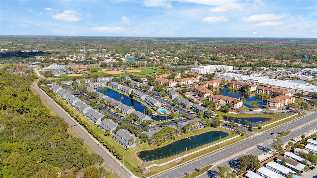 291 Countryside Key Boulevard Oldsmar, FL 34677 - Photo 33 of 34 an aerial view of residential houses with outdoor space