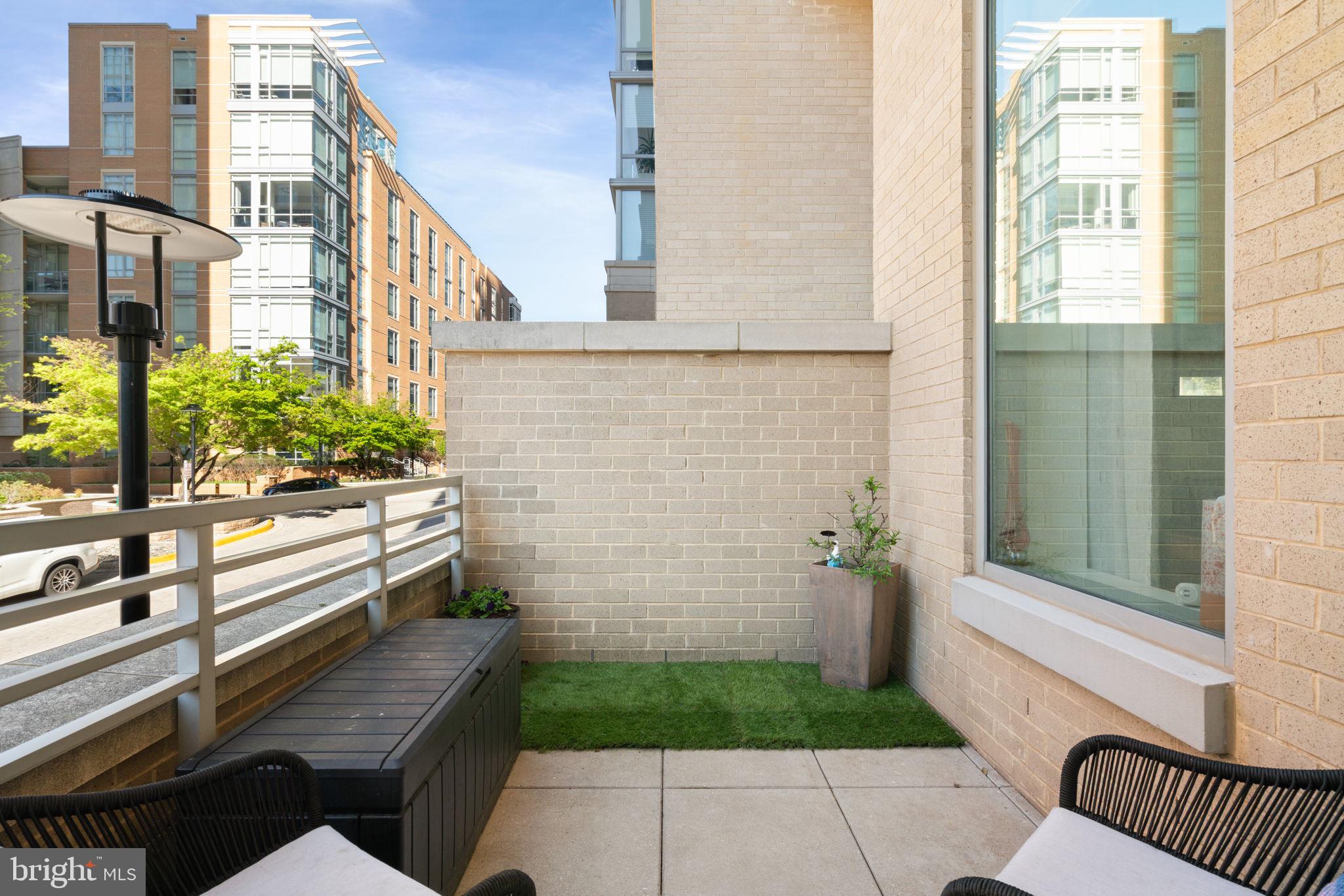 11990 Market Street, Unit 101 Reston, VA 20190 - Photo 21 of 44 Balcony Off Kitchen