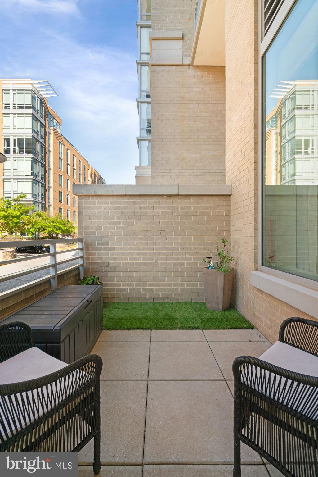 11990 Market Street, Unit 101 Reston, VA 20190 - Photo 22 of 44 Balcony Off Kitchen