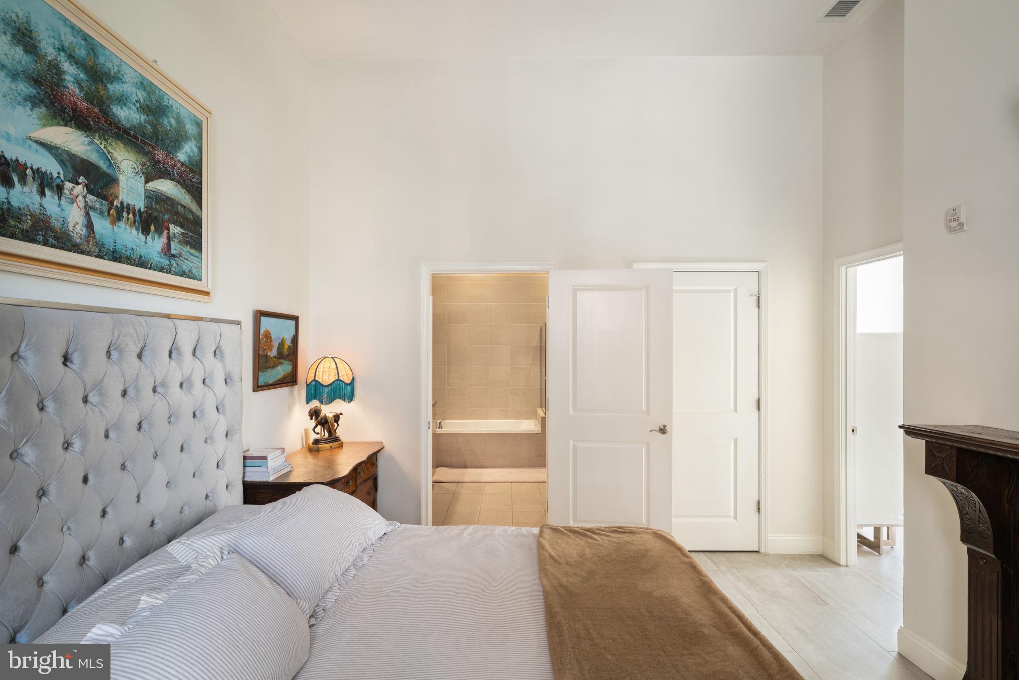 11990 Market Street, Unit 101 Reston, VA 20190 - Photo 25 of 44 Primary Bedroom