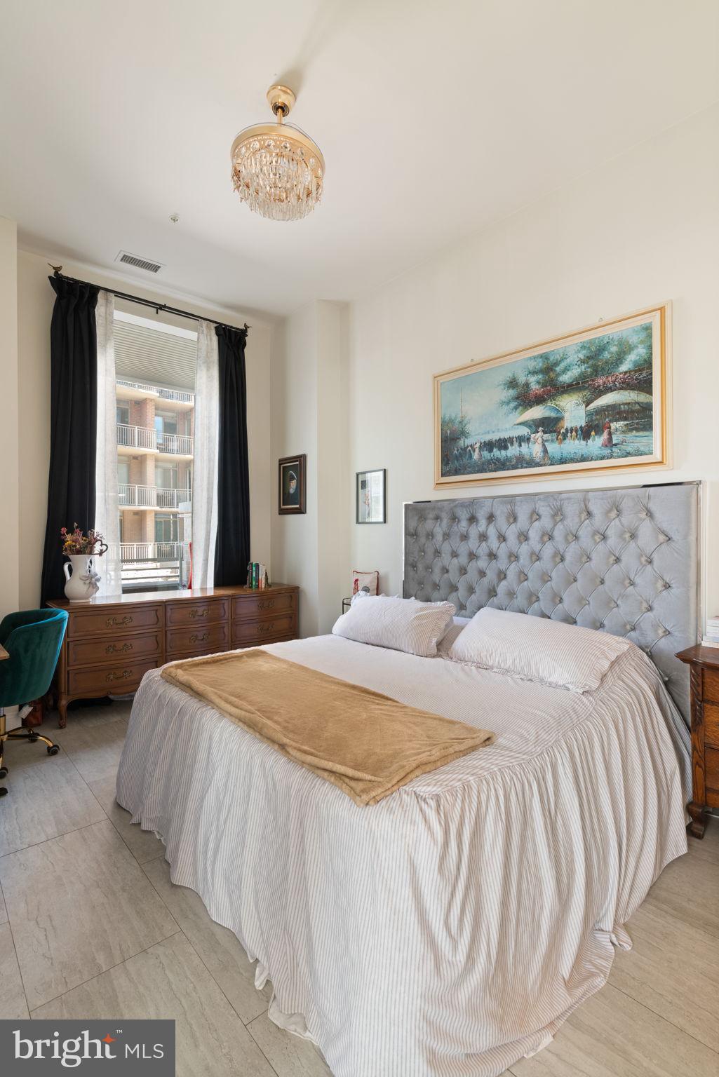 11990 Market Street, Unit 101 Reston, VA 20190 - Photo 26 of 44 Primary Bedroom