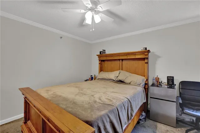 a bathroom with a toilet sink vanity and mirror