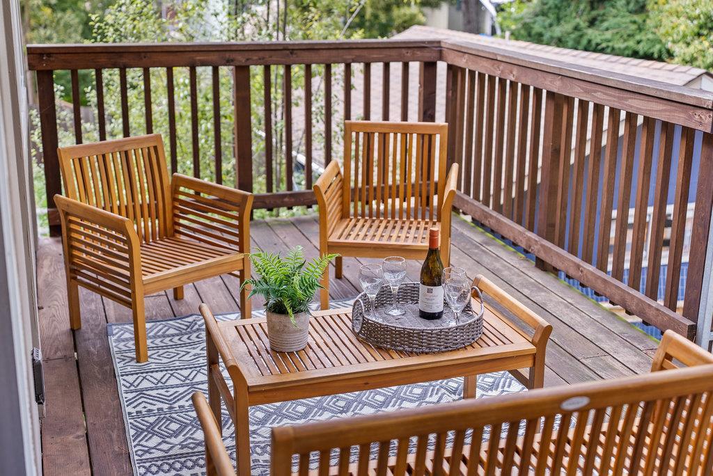 416 Semple Avenue Aptos, CA 95003 - Photo 17 of 45 a view of a chair in wooden deck