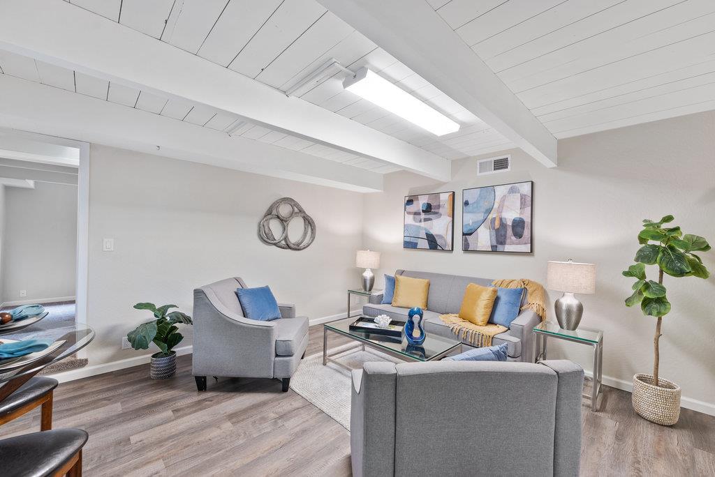 416 Semple Avenue Aptos, CA 95003 - Photo 25 of 45 a living room with furniture and a wooden floor
