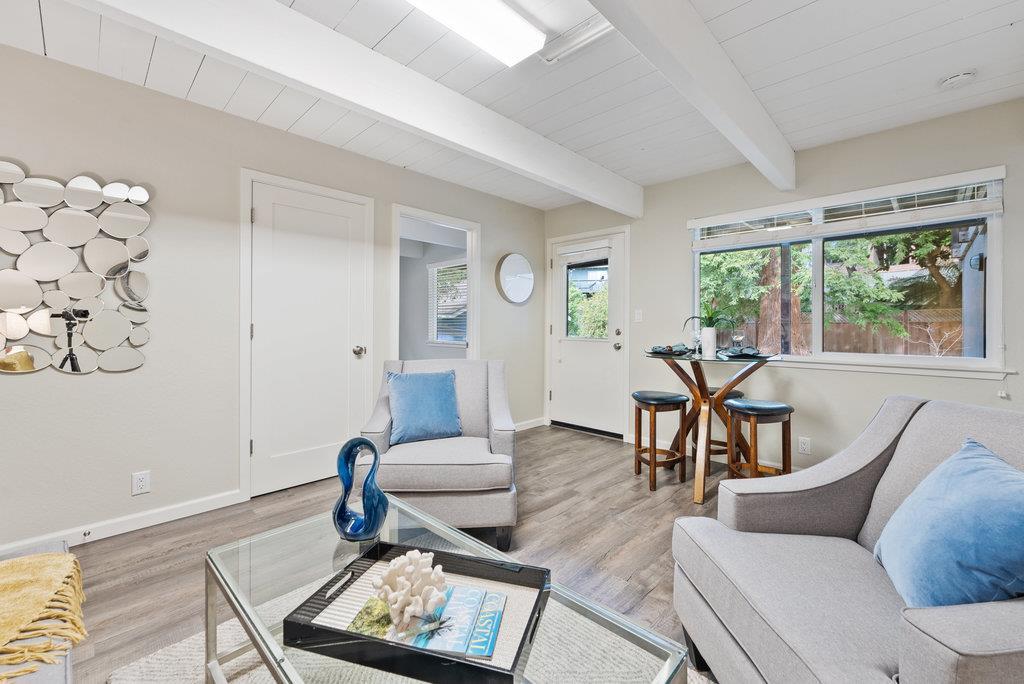 416 Semple Avenue Aptos, CA 95003 - Photo 26 of 45 a living room with furniture and wooden floor