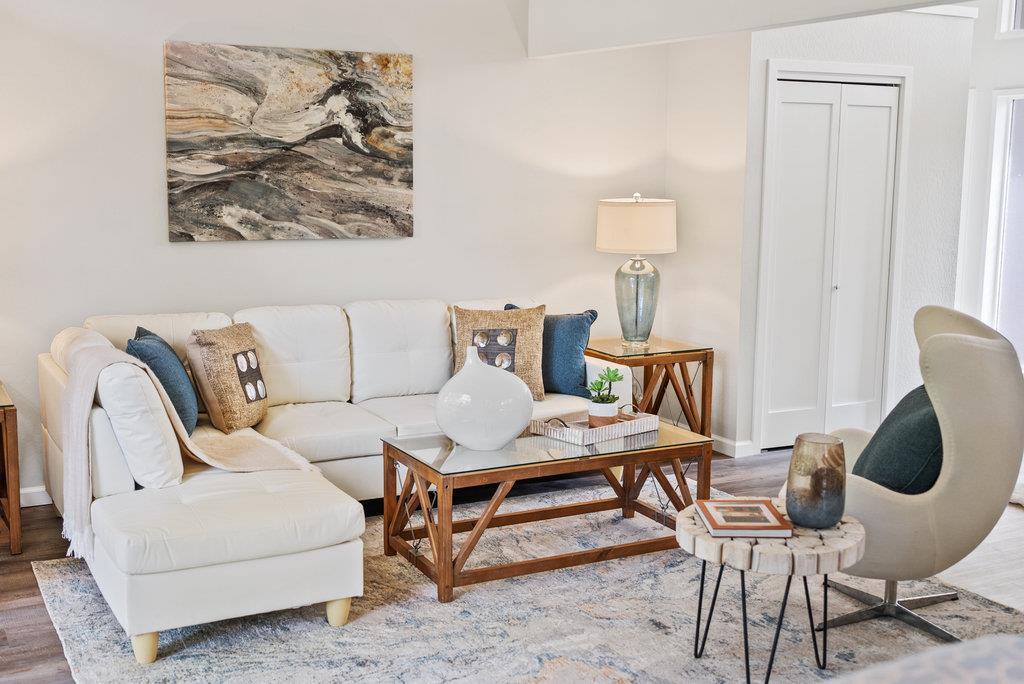 416 Semple Avenue Aptos, CA 95003 - Photo 6 of 45 a balcony with furniture and painting on the wall