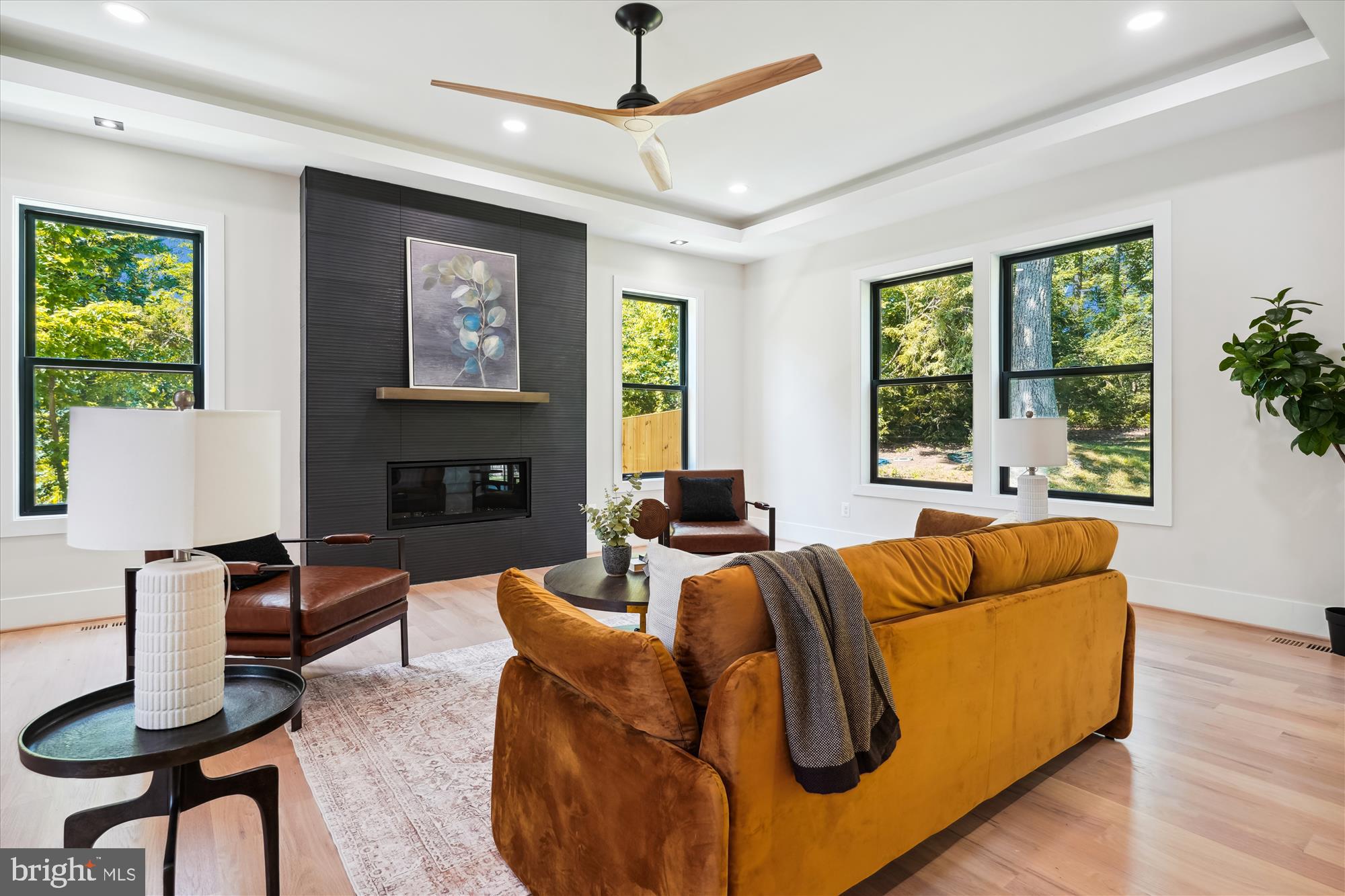 1927 Griffith Road Falls Church, VA 22043 - Photo 27 of 33 a living room with furniture fireplace and a large window