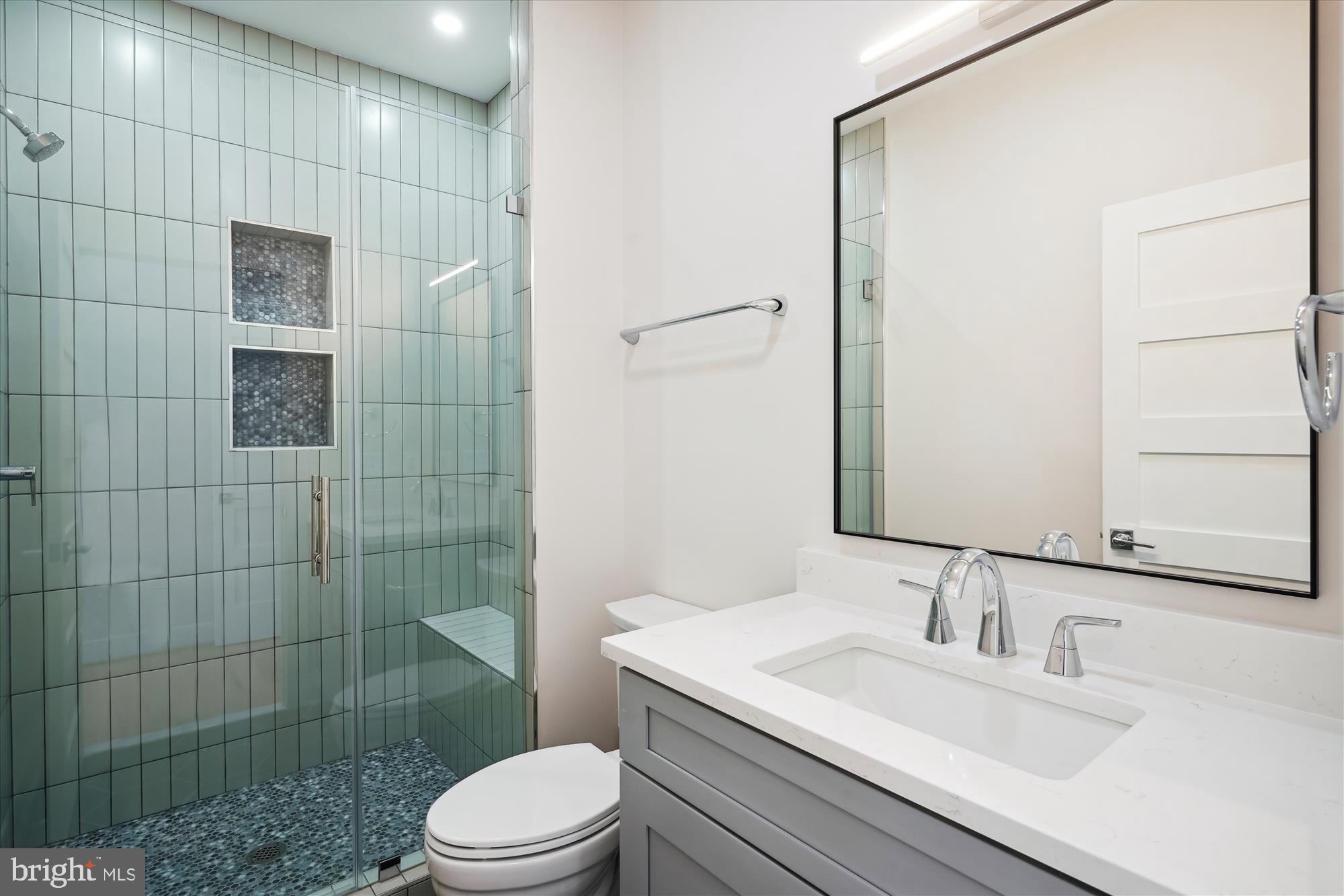 1927 Griffith Road Falls Church, VA 22043 - Photo 29 of 33 a bathroom with a sink a toilet and shower