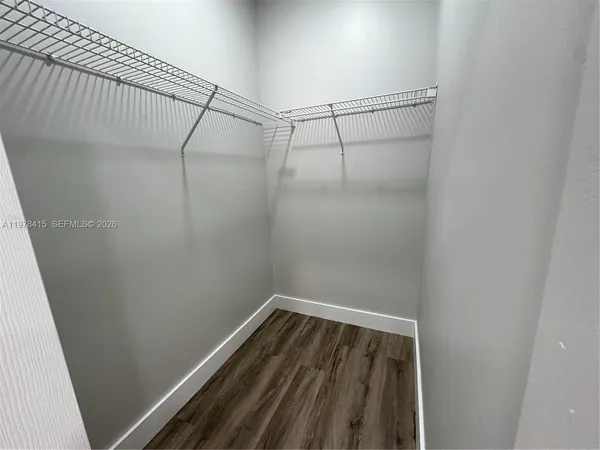 a view of a room with racks on the wall