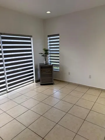 a view of a livingroom with furniture