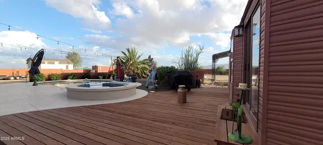 a view of backyard with a small cabin