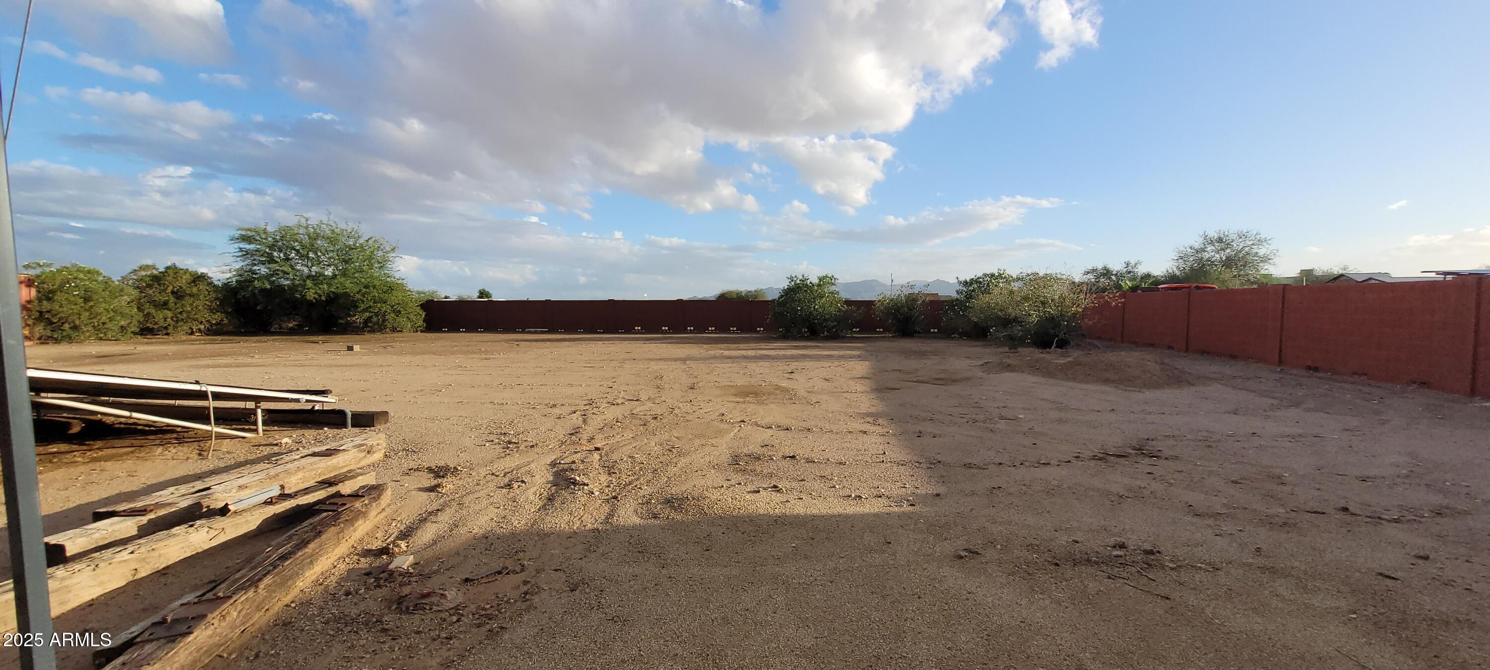 22219 West Blue Sky Drive, Unit CASITA Wittmann, AZ 85361 - Photo 14 of 15 a view of a terrace with sky view
